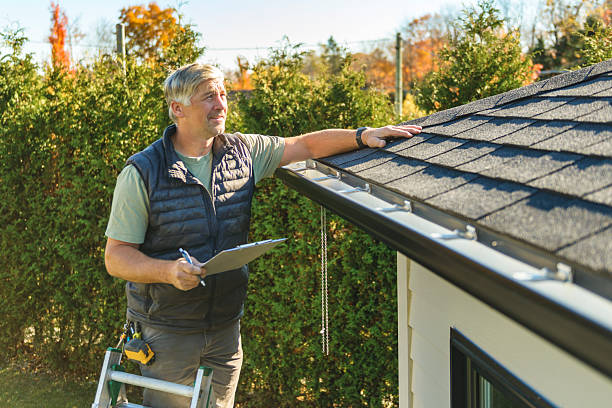 Professional Hail Damage Roof Repair technician working in Versailles, KY